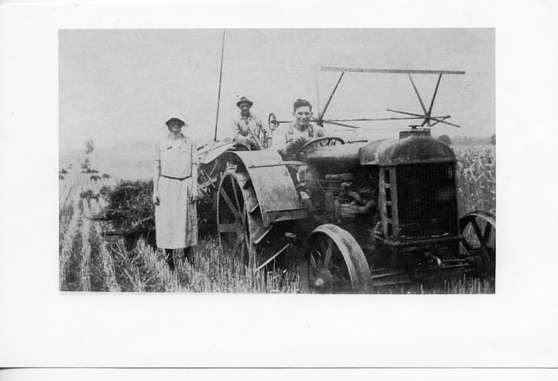 Front View of Anna and Emil Brockmeir with Herb Maack on Tractor