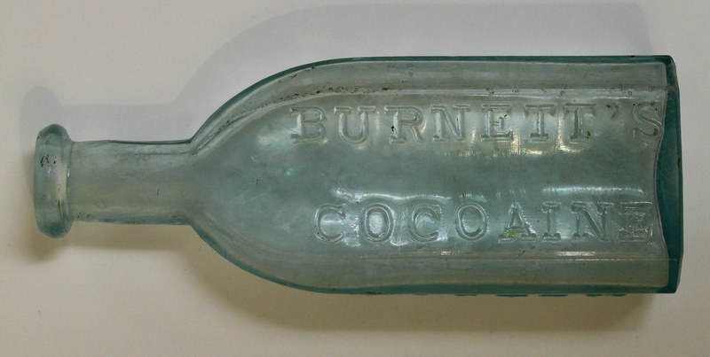 Burnett Company Glass Medicine Bottle