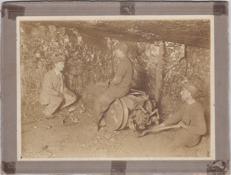 Two Donk Brothers Miners and Man in Suit inside Mine Shaft