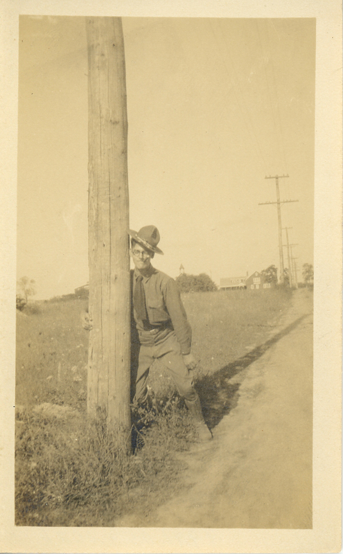 WWI Serviceman Leans Against Utility Pole