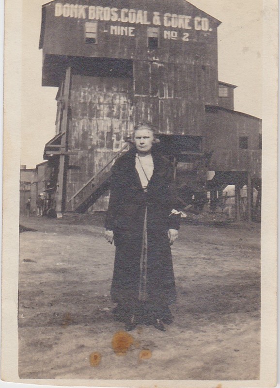 Woman Standing in Front of Mine Entrance Building to "Donk Bros.Coal & Coke Co. Mine no. 2"