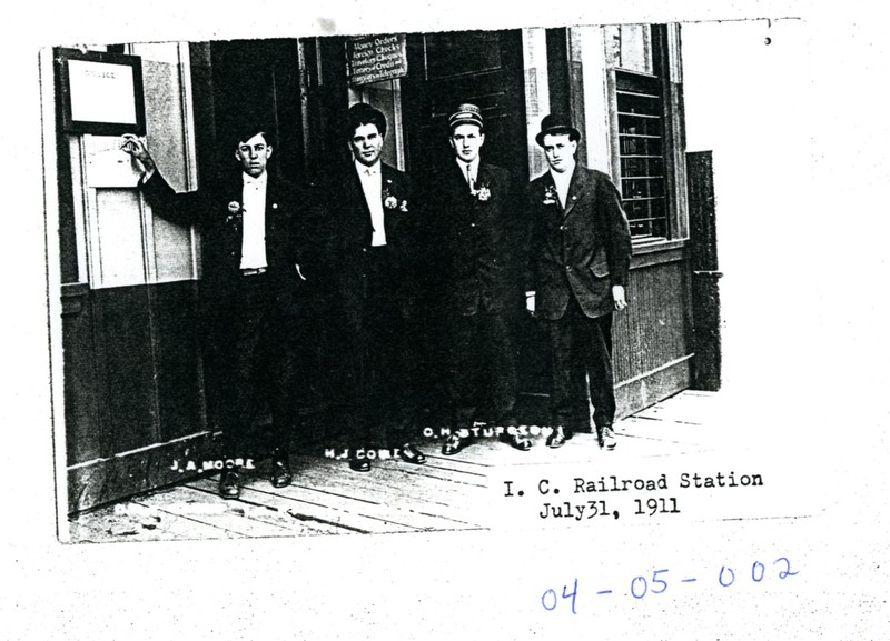 Men at Illinois Central Railroad Station 