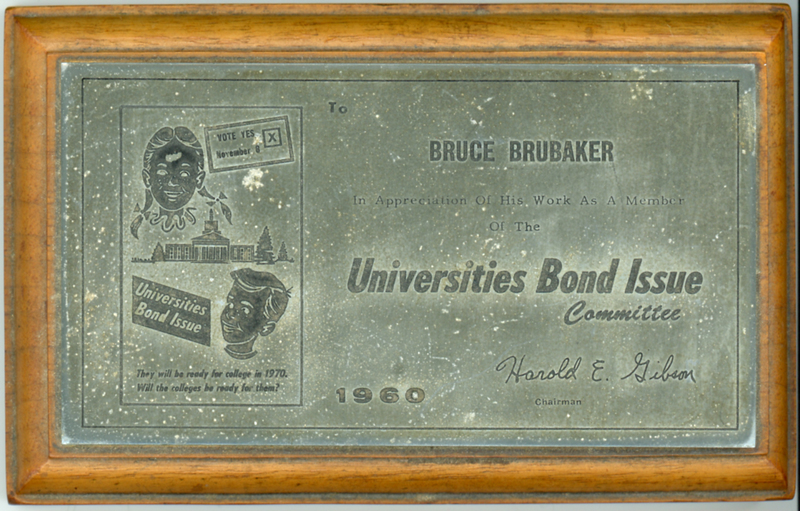 1960 Paperweight issued to Bruce Brubaker for serving on the Universities Bond Issue Committee