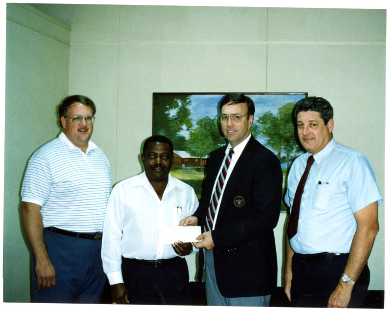 1990s Amoco Presenting Check to Boy Scouts