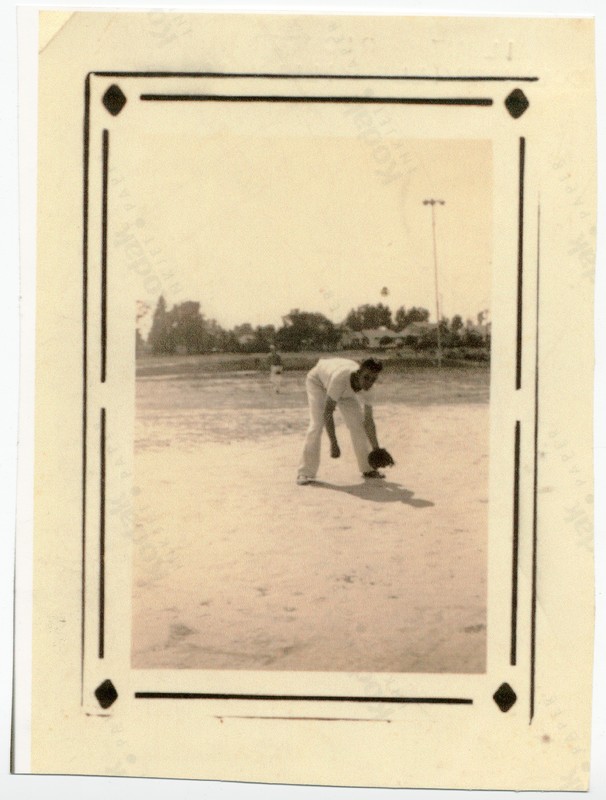 Baseball Player Posing to Field a Ball