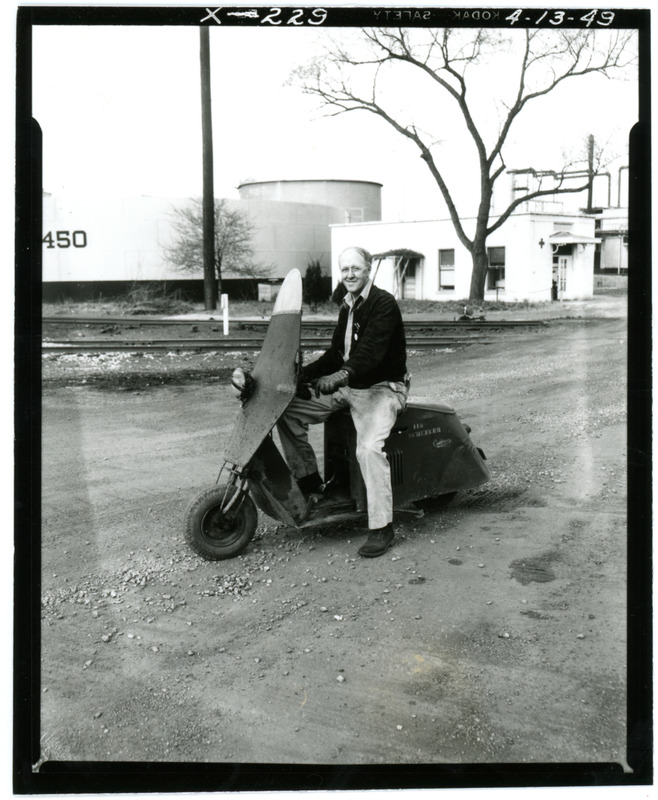 1949 Man on Moped in Refinery Yard