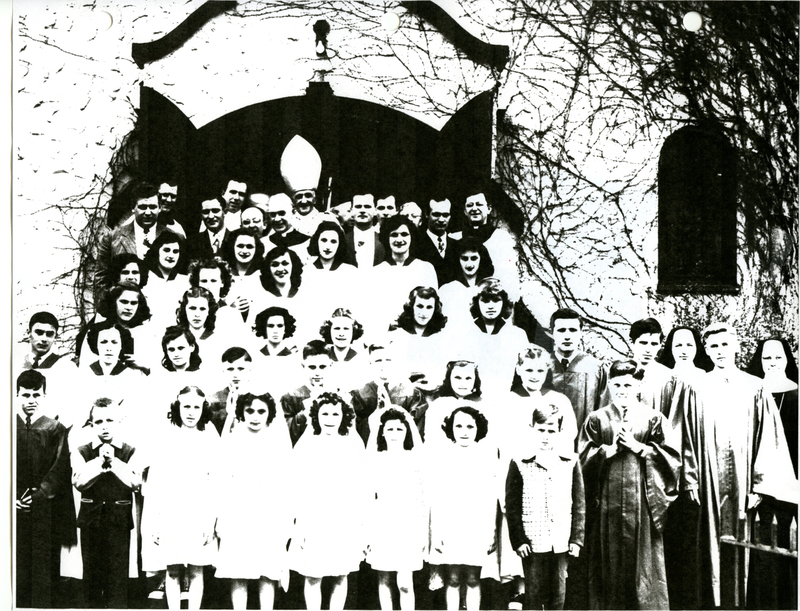 Children on the Steps of the Church after First Communion Ceremony.