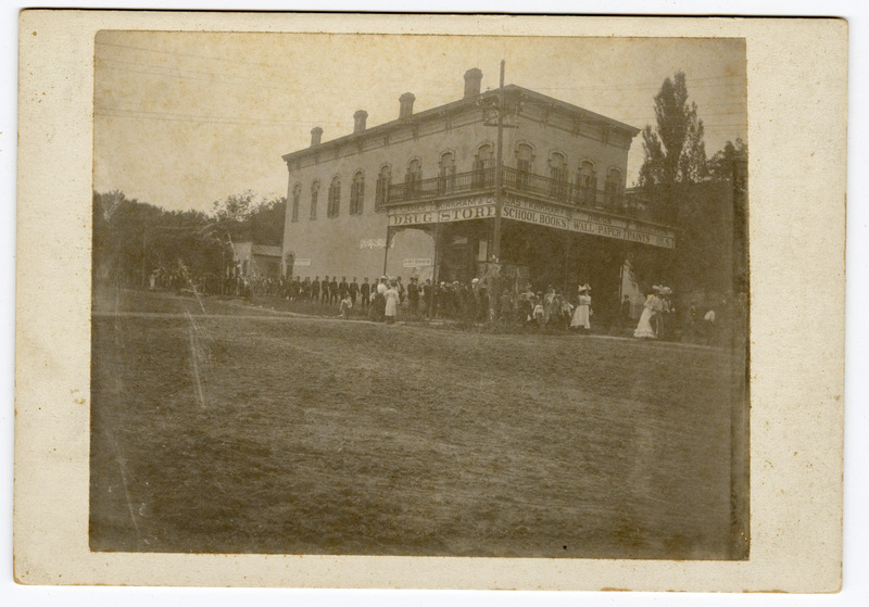 Photograph of Patrons going to a Drug Store