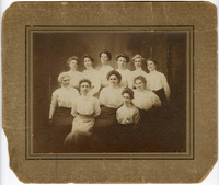 Photograph of Eleven Women in Shirtwaists with a Swastika Pin