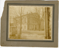Photograph of the exterior of the 1857 Madison County Courthouse with a Peanut and Popcorn Wagon
