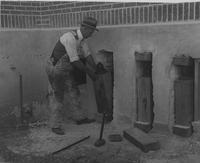 1926  Man Repairing the Madison County Tuberculosis Sanitarium in Edwardsville after Mine Subsidence
