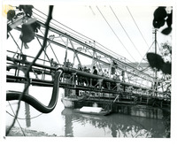 1957 Photograph People Walking from Barge Walkway to Land as Part of Open House Refinery Tour