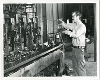 Worker at Owens-Illinois Glass Factory in 1973