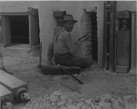 1926 Worker Using a Hacksaw During Repair Construction of the Madison County Tuberculosis Sanitarium in Edwardsville after Mine Subsidence