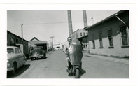 1952 Man Driving Moped in Refinery Yard During Standard Oil Strike 