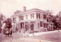 Photograph of the Mudge family home (Oakdale) in Grantfork with members of the Mudge family