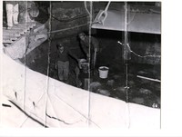 Men working in a pit inside the mine