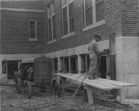 1926 Worker Repairing a Pneumatic Compression Crack at the Madison County Tuberculosis Sanitarium in Edwardsville after Mine Subsidence