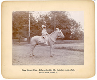 1898 Photograph of a Boy Dressed as a Herald in a Parade during Edwardsville&#039;s Free Street Fair Flower Parade